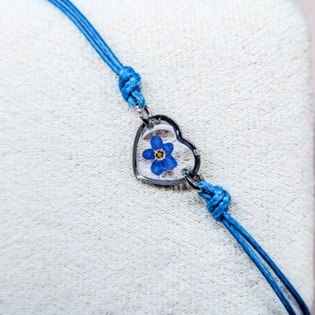Forget me not blue cord bracelet in silver